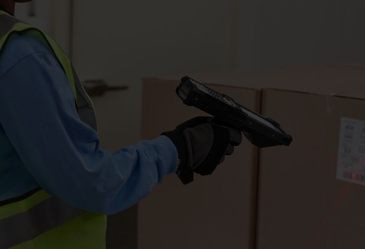 Warehouse worker scanning boxes